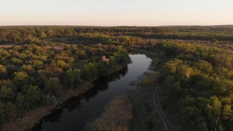 Flying above Milk river with forests and fields in Ukraine, Melitopol, Sosnovka  Stock Footage 114246812