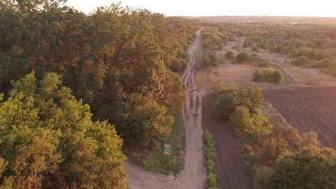 Flying above Milk river with forests and fields in Ukraine, Melitopol, Sosnovka  Stock Footage 114247990