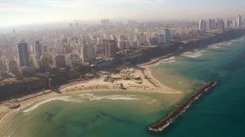Flying above Natanya promenade area, Stock Video Pond5