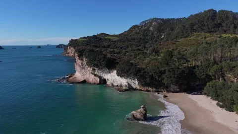 Flying Above Paradise: Dramatic Aerials of Cathedral Cove's Pristine Coast, New Stock Footage 346904656