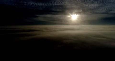 Flying above real clouds into sun Stock Footage 91468268