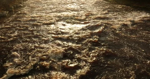 Flying above a river in full flow Video stock 321601544