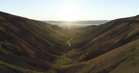 Flying above a river in the valley Video stock 168164521