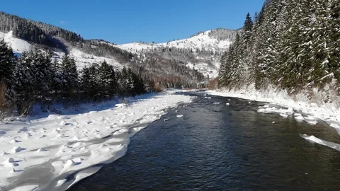 Flying above  river in winter. Stock Footage 124551990