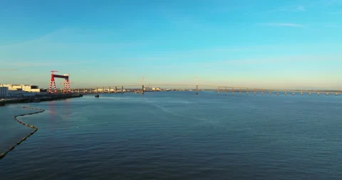 Flying above the road of cable-stayed French bridge. Amazing sunrise. Aerial Stock Footage 239361669