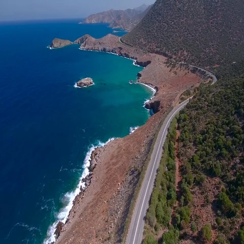 Flying above road by seashore Stock Footage 69290277