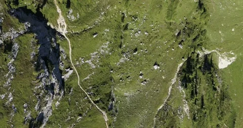 Flying above rocks and Meadows high up in the mountains, Alpine Landscape Stock Footage 149391826