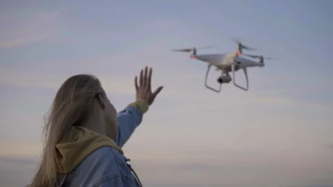 Flying above sea copter checking video of girl 스톡 동영상 91058368