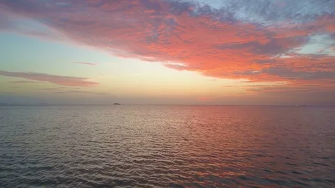 Flying above Sea Surface at Sunset Stock Footage