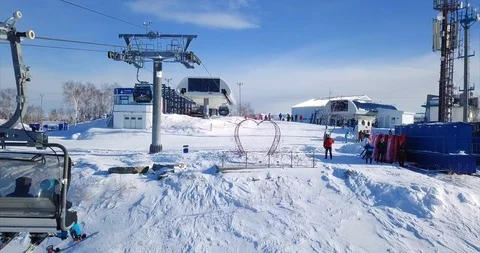 Flying above ski resort "Mountain air", view of ski lift elevator. Russia Stock Footage 88485778
