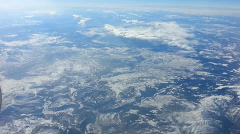 Flying above snowy mountains Stock Footage 33608514