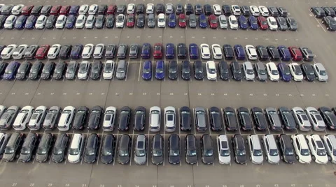 Flying Above Storage Parking Lot of New Unsold Cars, aerial view Stock Footage
