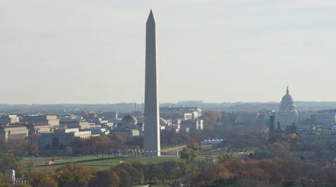Flying above the Tidal Basin past Washington Monument, Capitol in background. Stock Footage 59198956