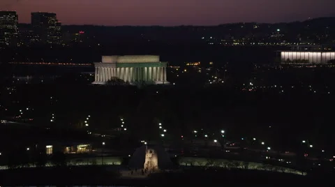 Flying above the Tidal Basin in Washington DC at night; Martin Luther King Stock Footage 59192283
