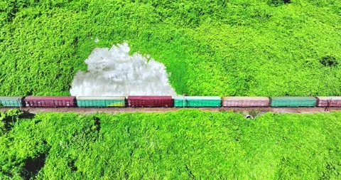 Flying above train rushing along the picturesque Hai Van Pass, Hue, Vietnam Stock Footage 342393589