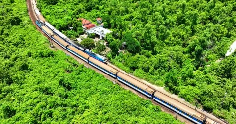 Flying above train rushing along the picturesque Hai Van Pass, Hue, Vietnam Stock-Footage 342394790