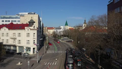 Flying above two railways on totally empty SPN square in centre Bratislava Stock Footage 127449657