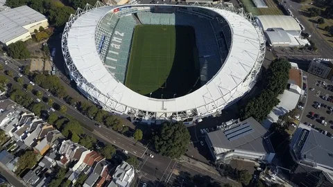 Flying above two stadiums panning up Stock Footage 106591774
