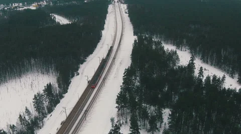 Flying Above Winter Forest and Railroad Stock Footage 47463228