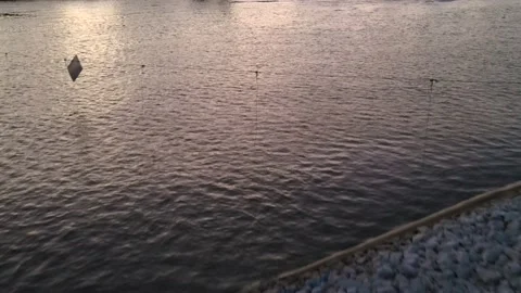 Flying across Des Moines River near Center Street Bridge and Lauridsen Skatepark Stock Footage 201691080