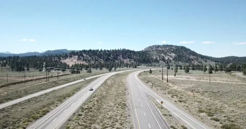 Flying Across Highway in Eastern Sierra Nevada Mountains Inyo National Forest Video stock 219581297