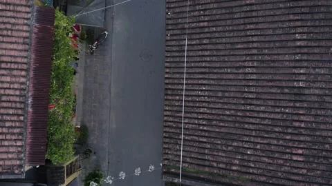 Flying across rooftop in ancient town of Hoi An Stock Footage 149087026