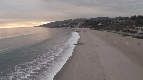 Flying Aerial in reverse over Malibu beach at sunset #10 Stock Footage 46628802