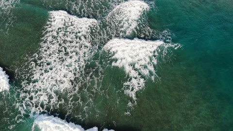Flying aerial view of waves splashing motion,gradient turquoise blue sea water Stock Footage 125596317
