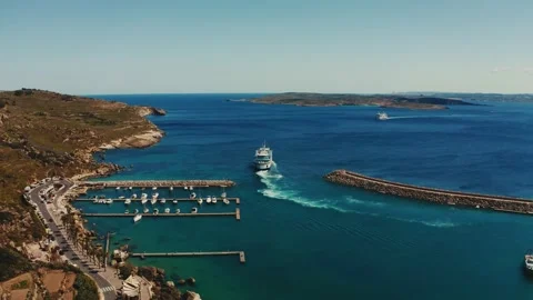 Flying after a ferry ship in Gozo Stock-Footage 182999108