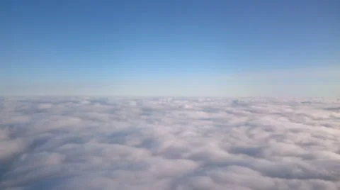Flying in the air with clouds passing by Stock Footage 49630021