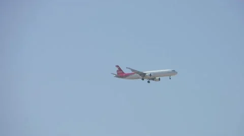 Flying airliner Stock Footage 21083471