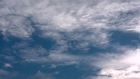 Flying airplane on the blue sky Stock Footage 87101997