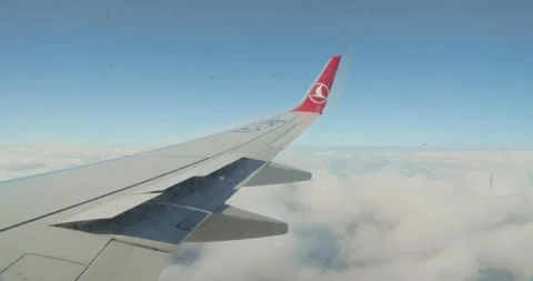 Flying airplane in the skies Stock Footage 132397850