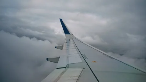 Flying Airplane Through Dense Clouds Stock Footage 308995495