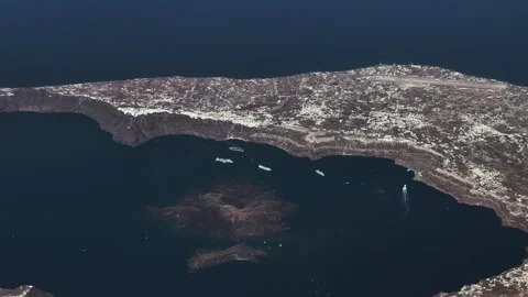 Flying along central part of Santorini, a famous Greek Island in Aegean Sea 库存影片 338409231