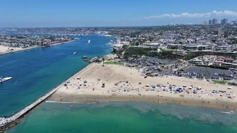 Flying along Corona del Mar State Beach, located in Corona del Mar Stock Footage 340075707