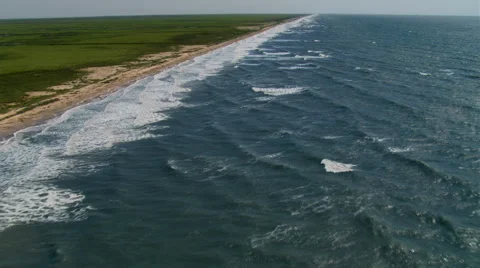 Flying along deserted Gulf coastline in Texas Stock Footage 59334643