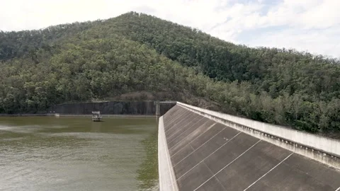 Flying along the edge of a Dam Wall Video stock 148607837