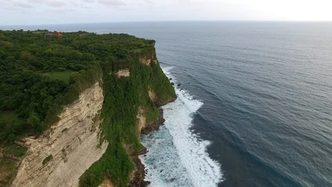 Flying along high cliffs of rocky ocean shore Stock Footage 108678201