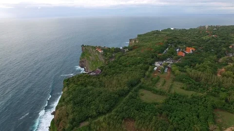 Flying along high cliffs of rocky ocean shore Stock Footage 108679248