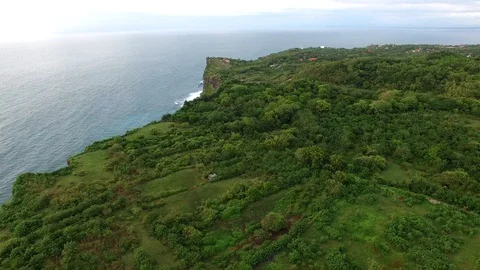 Flying along high cliffs of rocky ocean shore Video stock 108680293