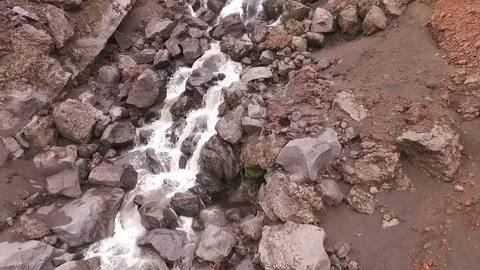 Flying along the mountain river. The stream flows through rocks Stock Footage 72653546