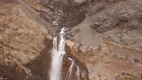 Flying along the mountain river. The stream flows through rocks Stock Footage 72656277