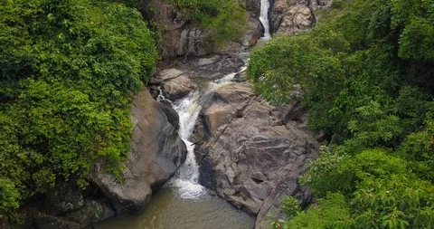 Flying Along mountain Waterfall and Rainforest Stock Footage 89158554