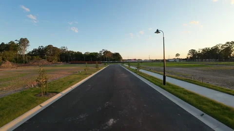 Flying along a new residential development road. Stock Footage 212652355