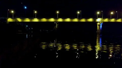 Flying along the night bridge Stock Footage 97859083