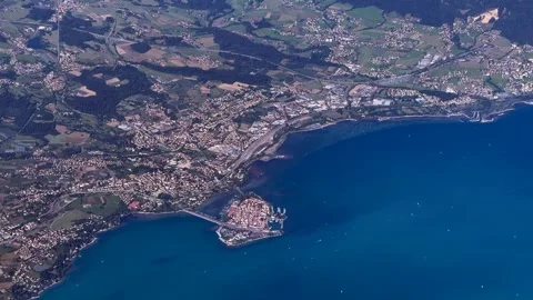Flying along north shoreline of eastern part of Lake Constance near Lindau 스톡 동영상 338409425