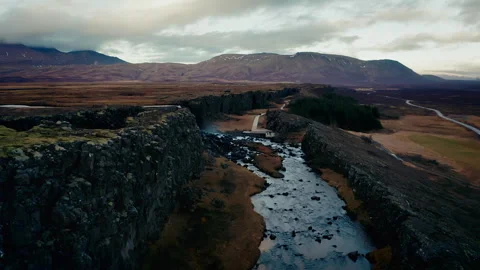 Flying along Oxararfoss waterfall, between the icelandic tectonic plates Stock Footage 261096707