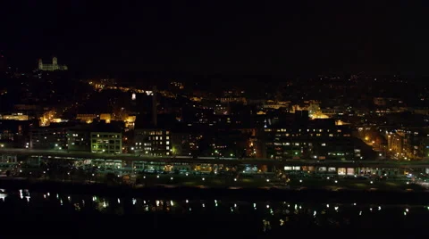 Flying along the Potomac toward Key Bridge at night, past Georgetown; National Stock Footage 59198353