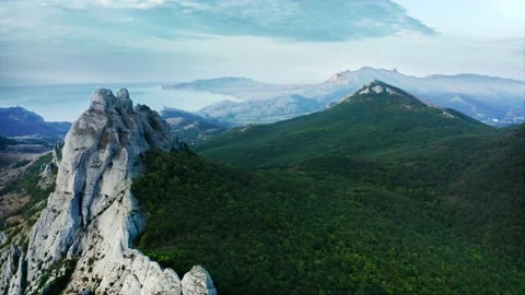 Flying along the ridge of rocks, the prospect of the sea coast and the lagoon Stock Footage 218404642